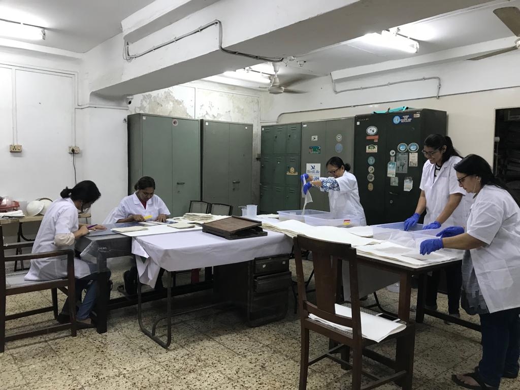 Book conservation — conservators working on manuscripts